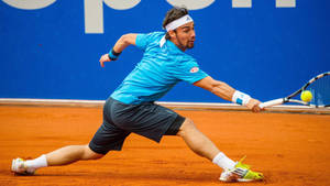 Fabio Fognini In Action On The Tennis Court Wallpaper