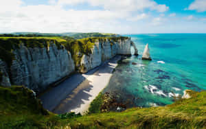 Falaise D'aval Towering White Cliff Ocean View Wallpaper