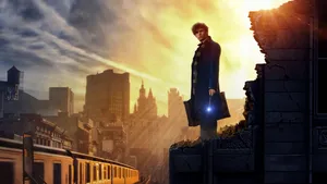 Fantastic Beasts And Where To Find Them Newt Scamander Standing On Top Of A Building Wallpaper