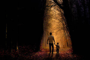 Father And Son In The Woods Wallpaper