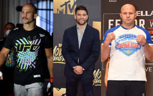 Fedor Emelianenko With Josh Thomson And Junior Dos Santos Wallpaper