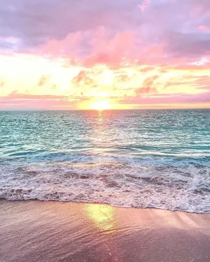 Feel The Calming Ocean Breeze And The Warmth Of The Sun While You Relax At Pastel Beach. Wallpaper