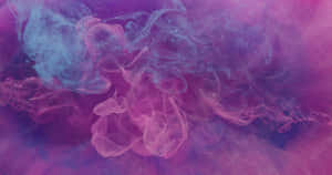 Feel The Enchanting Mystery And Beauty Of Smoke In This Captivating Photo. Wallpaper