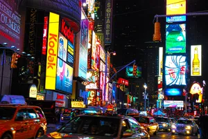 Feel The Hustle And Bustle Of The Bright Lights Of Times Square. Wallpaper