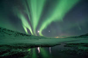 Feel The Power Of Nature From Iceland's Rugged Coastline Wallpaper