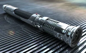 Feel The Power Of The Force With A Lightsaber In Your Hand Wallpaper