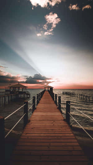 Feel The Sea Breeze While Spending A Day At The Beach With This Beautiful Ocean Aesthetic Phone. Wallpaper