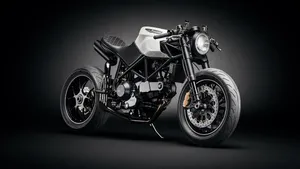 Feel The Wind In Your Hair As You Cruise Down The Open Highway On Your 2560x1440 Motorcycle Wallpaper