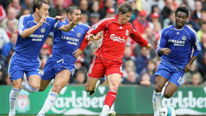 Fernando Torres With An Opponents Wallpaper