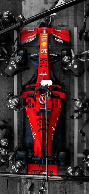 Ferrari F1 Car In The Pits Wallpaper