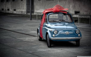 Fiat Blue Classic Car Present Wallpaper