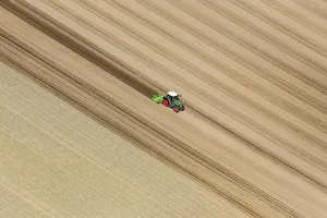 Field With Tractor Bird's-eye View Wallpaper