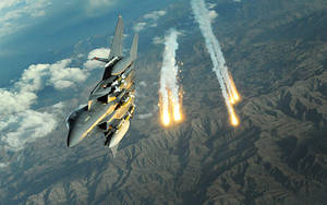 Fighter Jet With Rockets Wallpaper