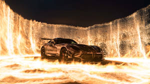 Fire Car In Wall Of Flames Wallpaper