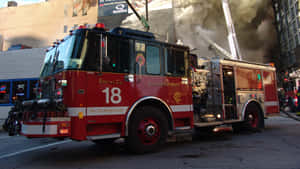 Fire Department Fire Truck On Street Wallpaper