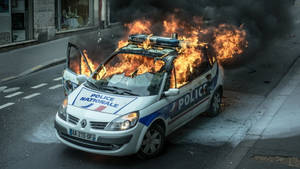 Fire Police Car On Road Wallpaper