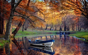 Fishing Boat During Autumn Wallpaper