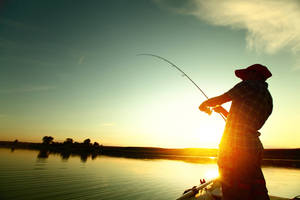 Fishing Under The Sunset Wallpaper