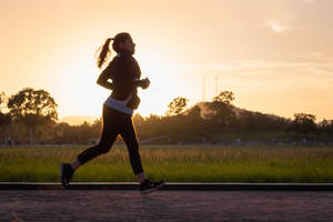 Fitness Jogging During Sunset Wallpaper