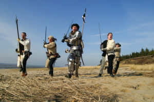 Five Men In Middle Ages Inspired Costume Wallpaper