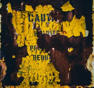 Flaking Grunge Caution Sign Wallpaper
