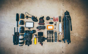 Flat Lay Of Photography Gears Wallpaper