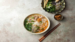 Flavorful And Delicious Pho With Flat Rice Noodles Wallpaper