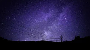 Fleet Of Stars Dancing In The Night Sky Wallpaper