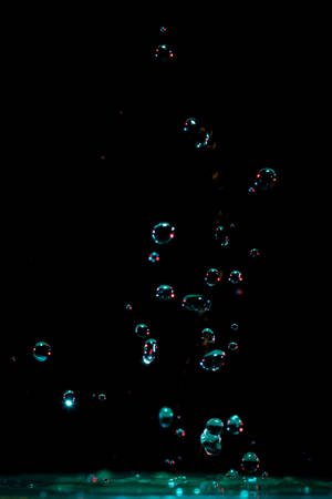 Floating Bubbles Black Phone Wallpaper