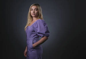 Florence Pugh In Purple Outfit Wallpaper