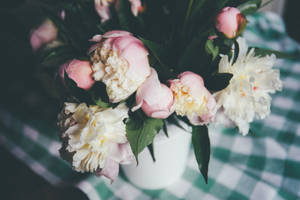 Flowers On Checkered Tablecloth Wallpaper