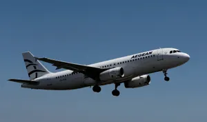 Flying Aegean Airlines Airbus A320-214 In Ombre Sky Wallpaper