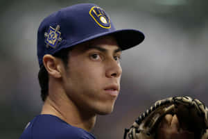 Focused Baseball Player With Glove Wallpaper