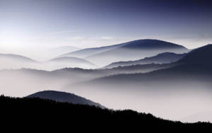 Fog Covered Hd Mountain Range Wallpaper