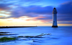 Fogged Lighthouse Wallpaper