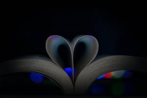 Folded Book Pages Dark Heart Wallpaper