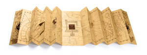 Folded Marauders Map On White Wallpaper