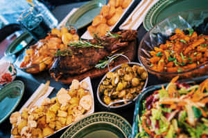 Food Table With Grilled Steak Wallpaper