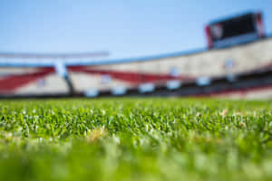 Football Field Focus With Bleachers Wallpaper