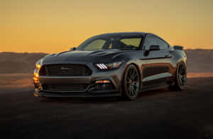 Ford Mustang Under A Golden Sunset Sky Wallpaper