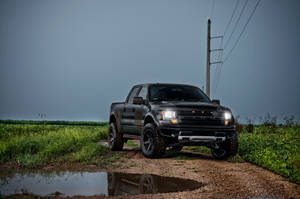 Ford Raptor In Jet Black Paint Wallpaper