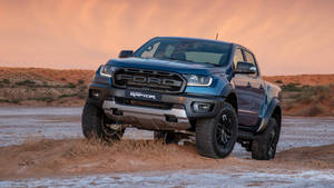 Ford Raptor With Off-road Suspension Wallpaper