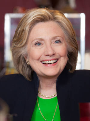 Former Secretary Of State Hillary Clinton Exuding Confidence Wallpaper