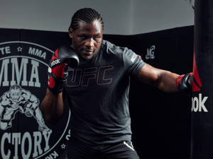 Francis Ngannou Punching Bag Wallpaper