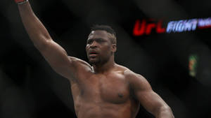 Francis Ngannou Raises Arm Wallpaper