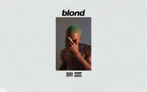 Frank Ocean With A Laptop, Showing Off His Creative Side. Wallpaper