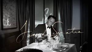 Frank Sinatra Pouring Alcohol On Glass Wallpaper