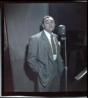 Frankie Laine Singing In A Studio Poster Wallpaper