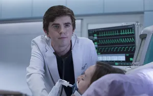 Freddie Highmore With Patient Wallpaper