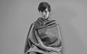 Freddie Highmore Wrapped With Blanket Wallpaper